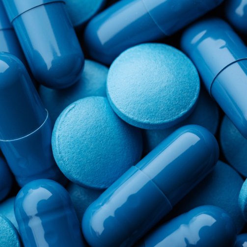 Close,Up,Of,Blue,Pills,Capsules.,Medicine,And,Pharmacy,Concept.